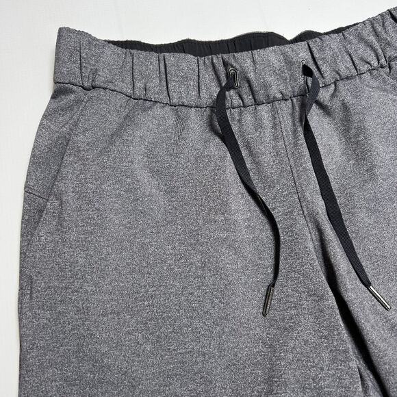 Lululemon On the Fly Crop Pants 23" SIZE 8 Heathered Black Travel Joggers - Picture 9 of 13